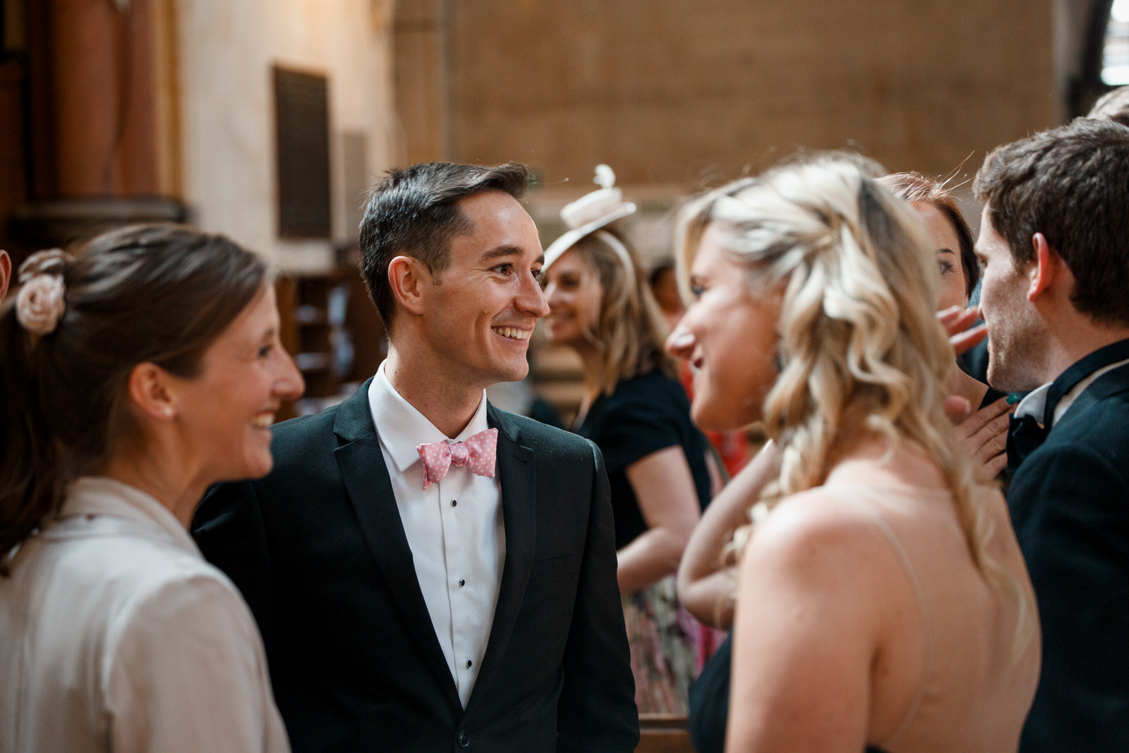 guests waiting for bride at cotswolds wedding