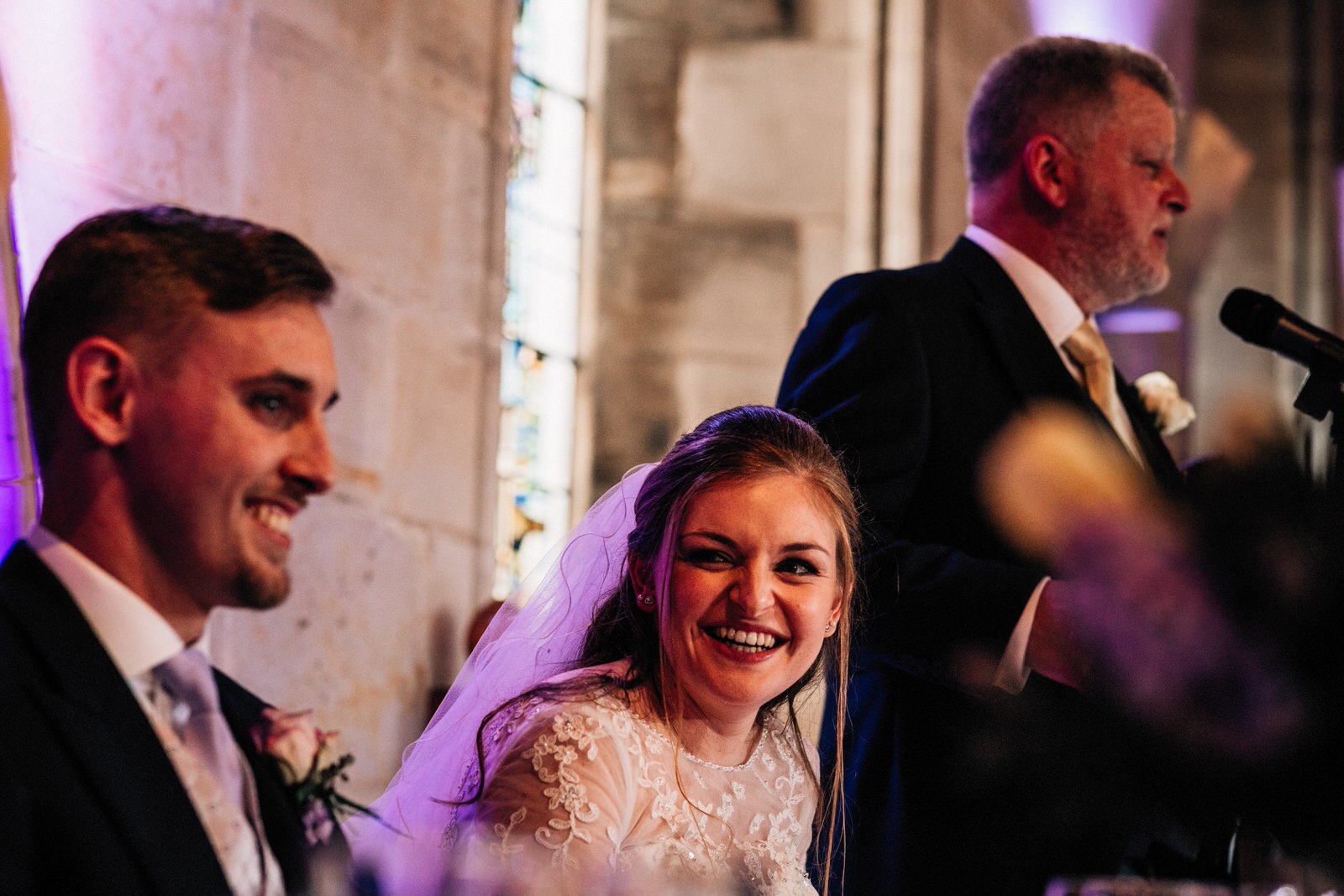 bride laughing at ashdown park wedding