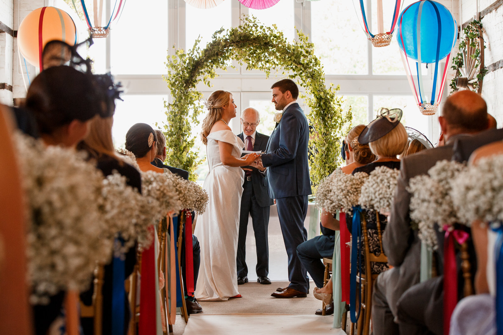 bride and groom at altar of lillibrooke manor wedding