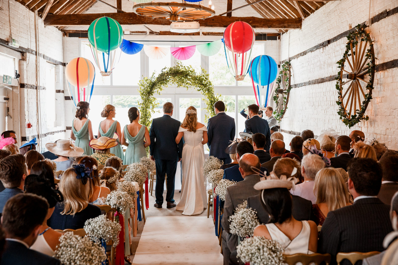 bride and groom at altar of lillibrooke manor wedding