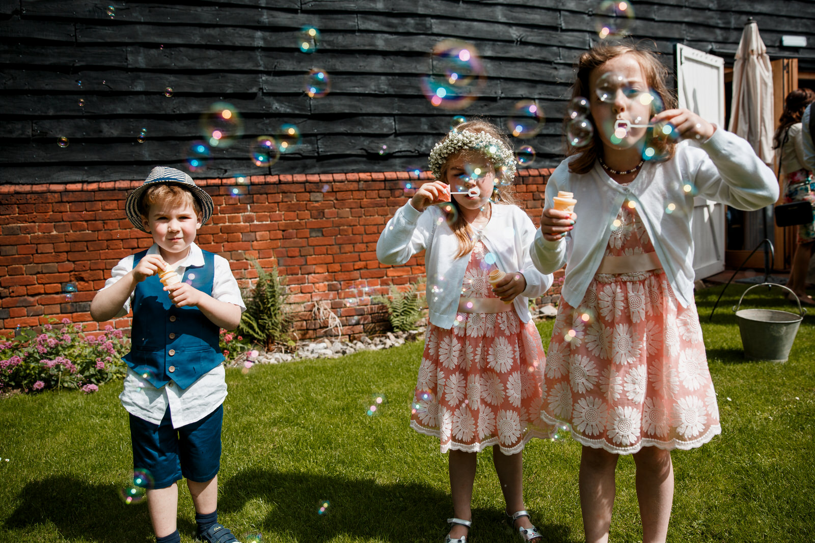 kids playing with bubbles outside lillibrooke manor