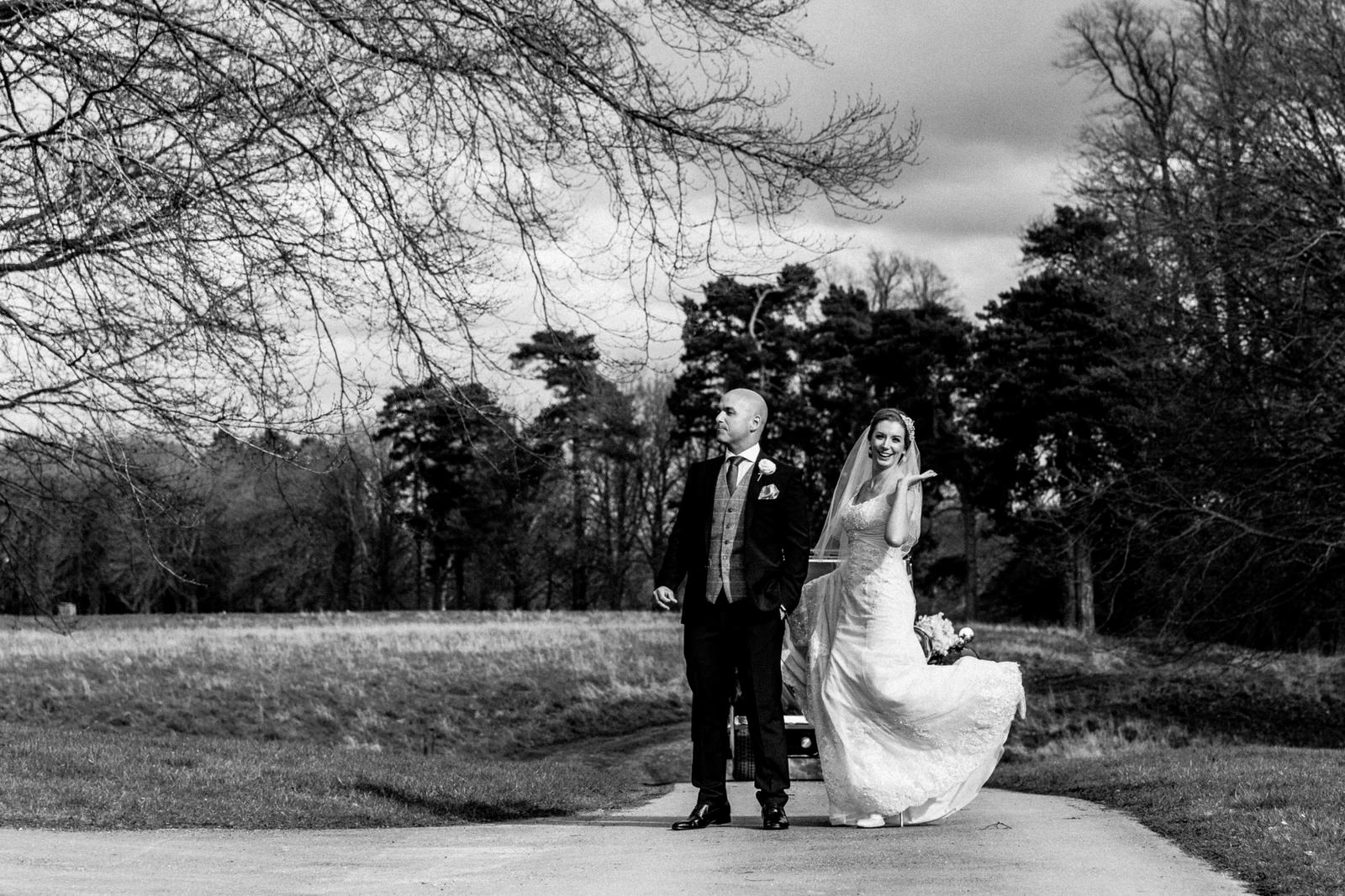 bride and groom in grounds at bowood hotel wedding