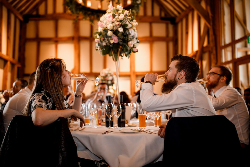 wedding guests drinking champagne
