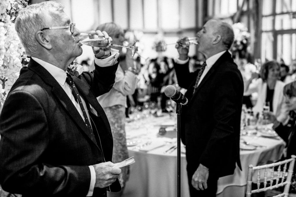guests toasting champagne at wedding day