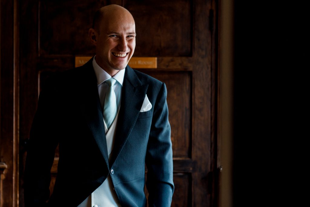 groom at great fosters wedding
