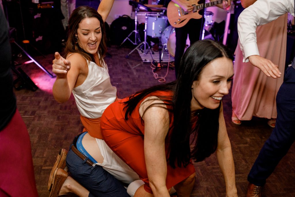 groom and mother dancing at wedding