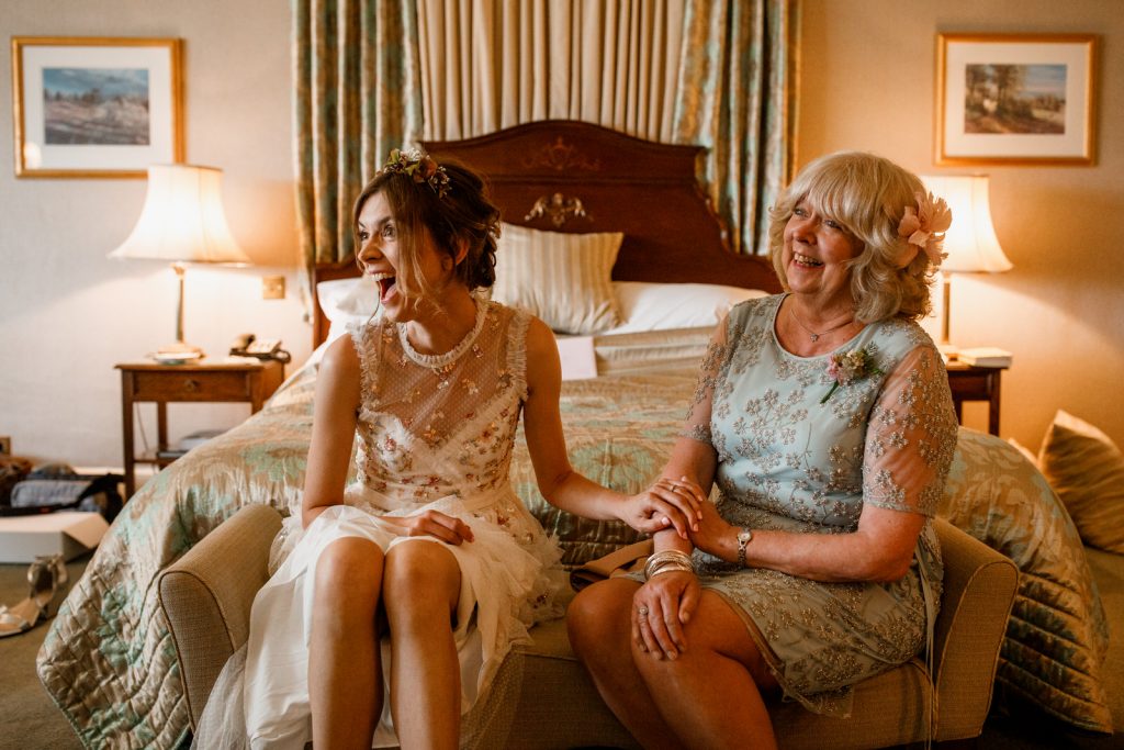 Mother and daughter getting ready for wedding