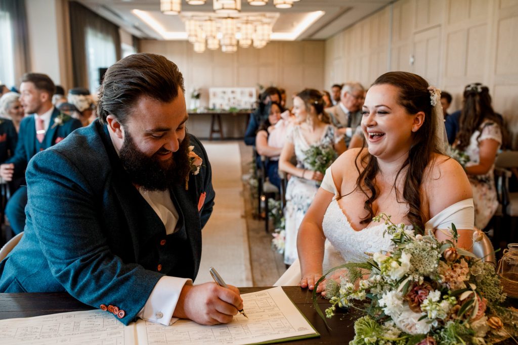 signing of the register at wedding