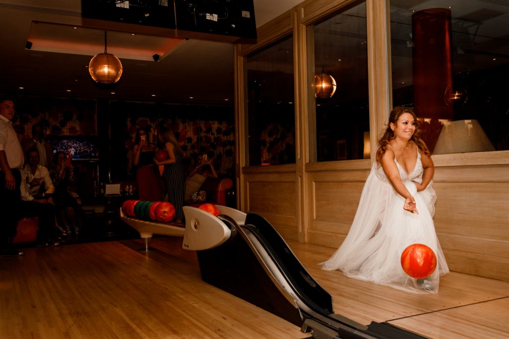 bride bowling at ham yard hotel wedding