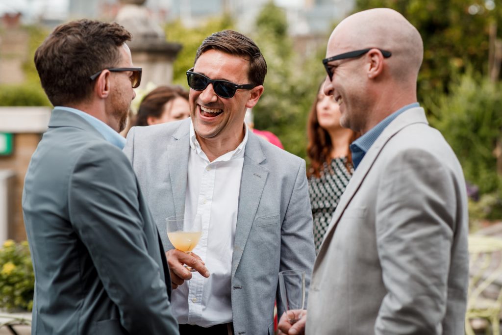 guests on roof garden at ham yard hotel wedding