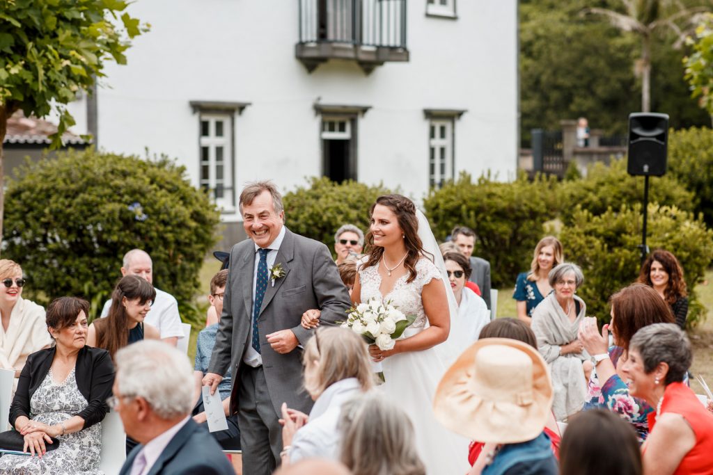father of the bride walking bride down aisle