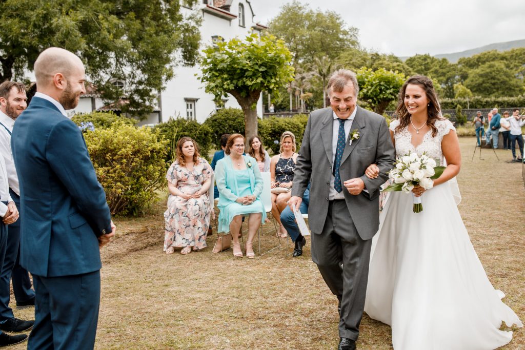 father of the bride walking bride down aisle