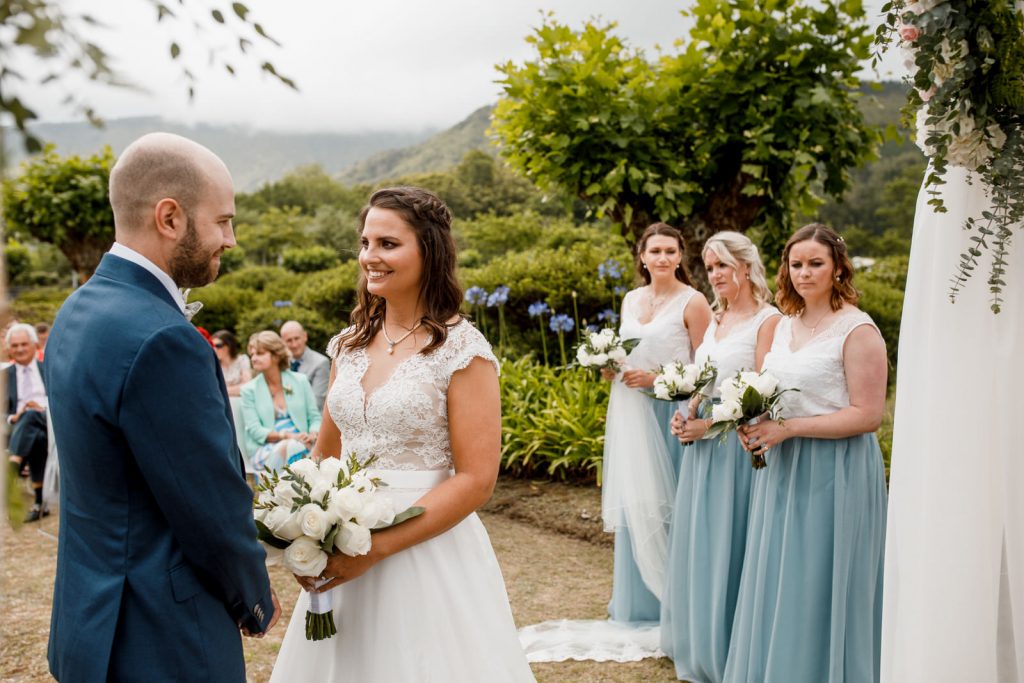 bridesmaids behind bride