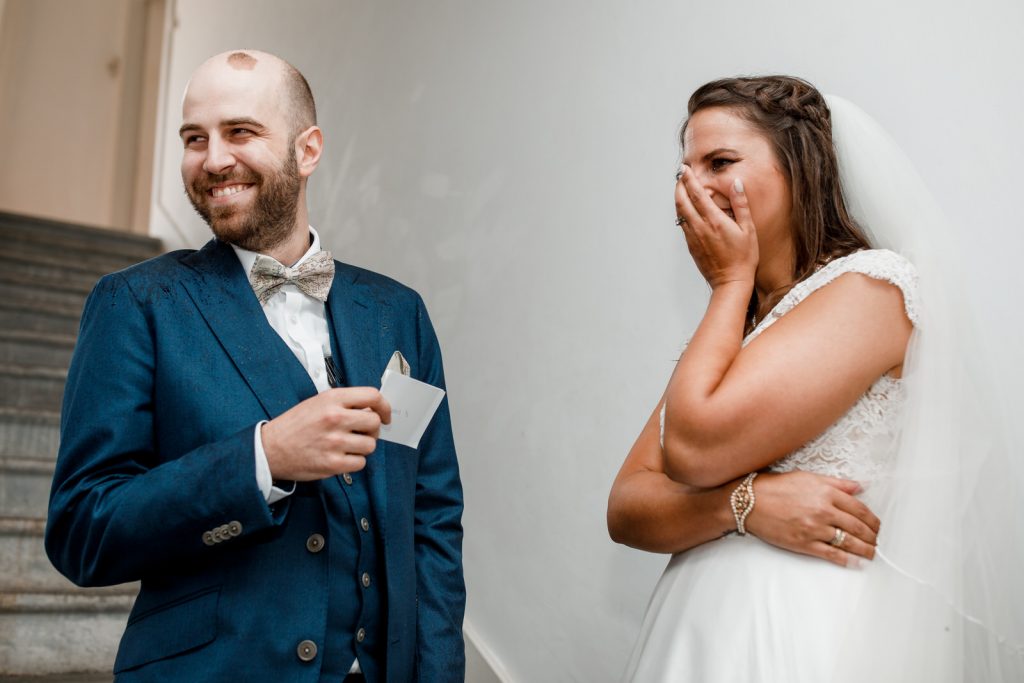 bride laughing at wedding vows