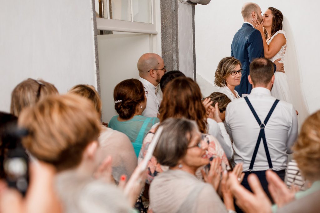 bride and groom first kiss at azores wedding