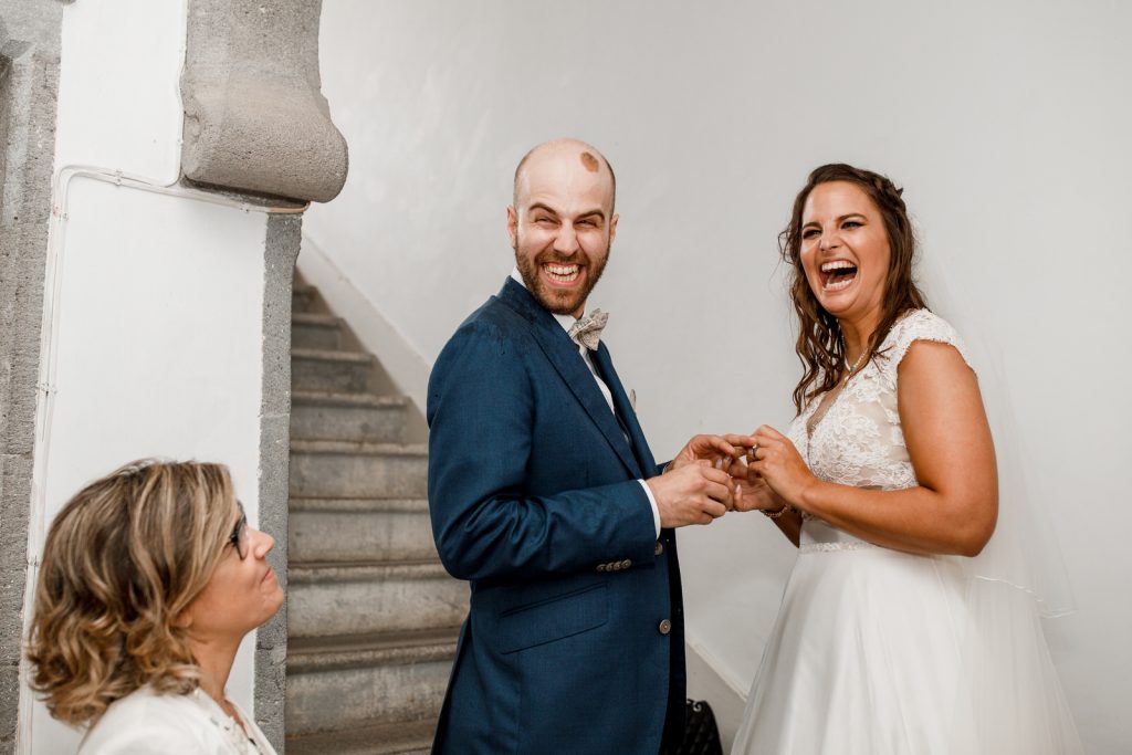 bride laughing at wedding vows