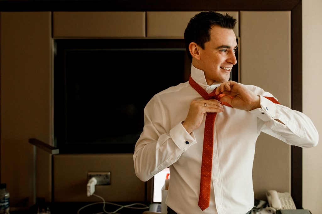 groom getting ready for london wedding