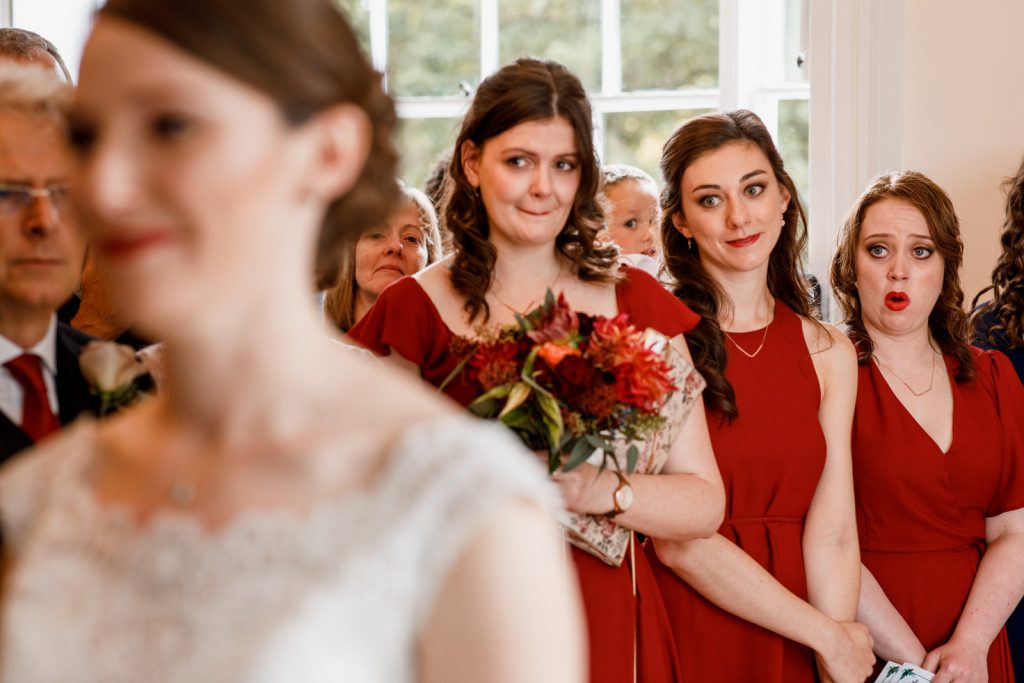 bridesmaid looking at bride