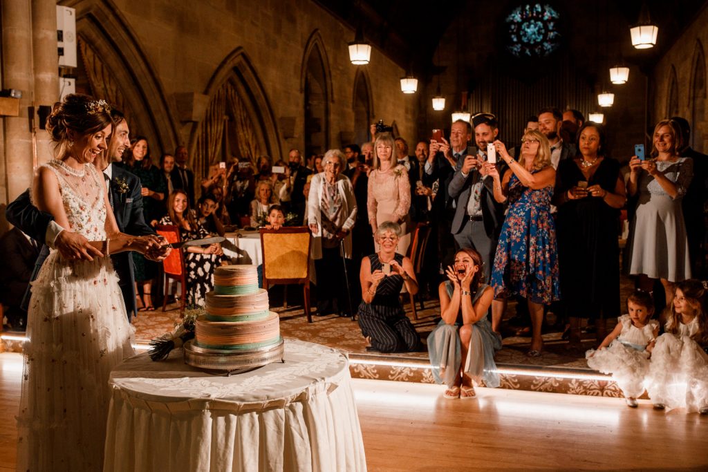 cutting of cake at ashdown park hotel