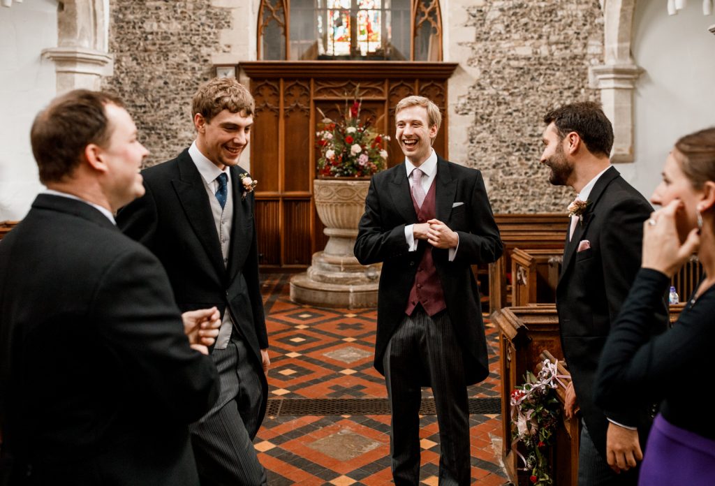 groom waiting at church