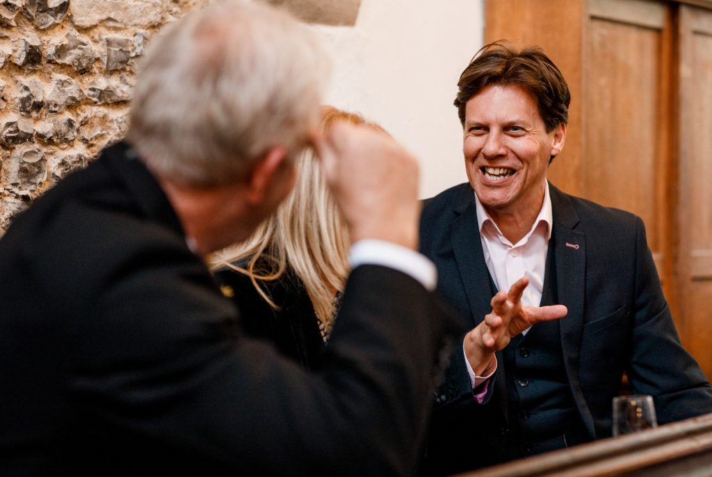 guests laughing at wedding in henley