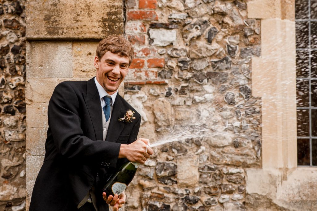 champagne spray at wedding