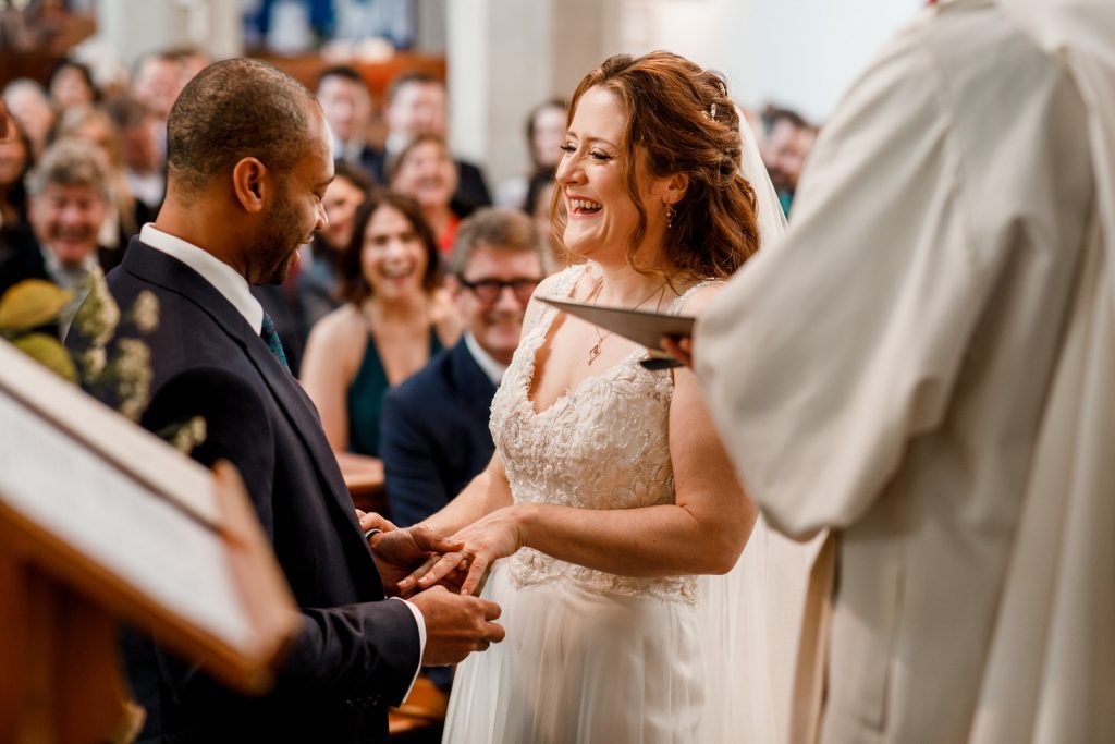 bride and groom at altar