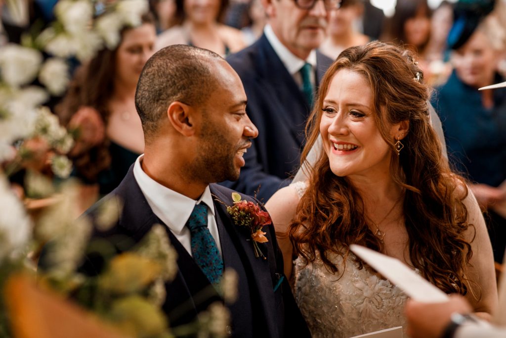 bride and groom at front of church