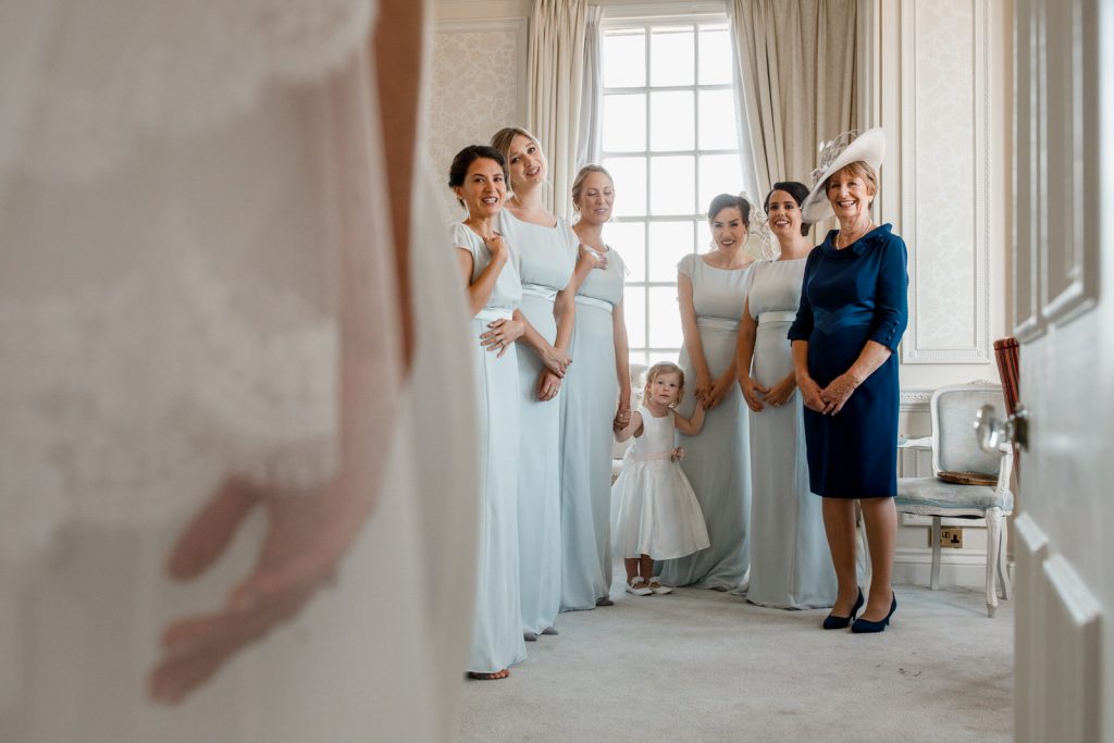bridesmaids seeing bride for the first time