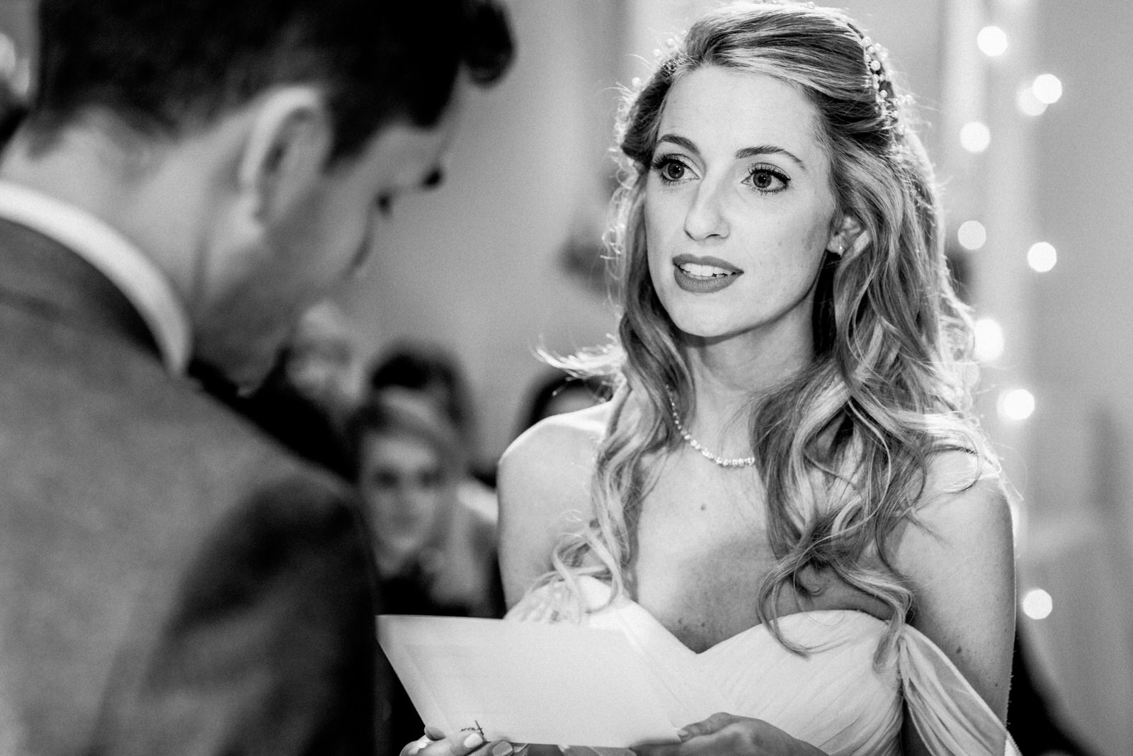 bride reading wedding vows