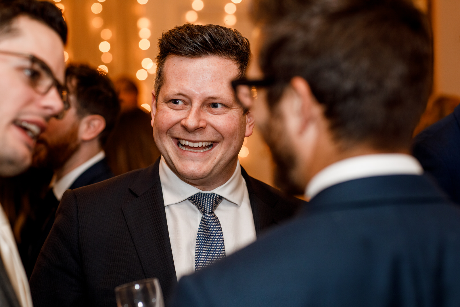 guest laughing at amadeus wedding