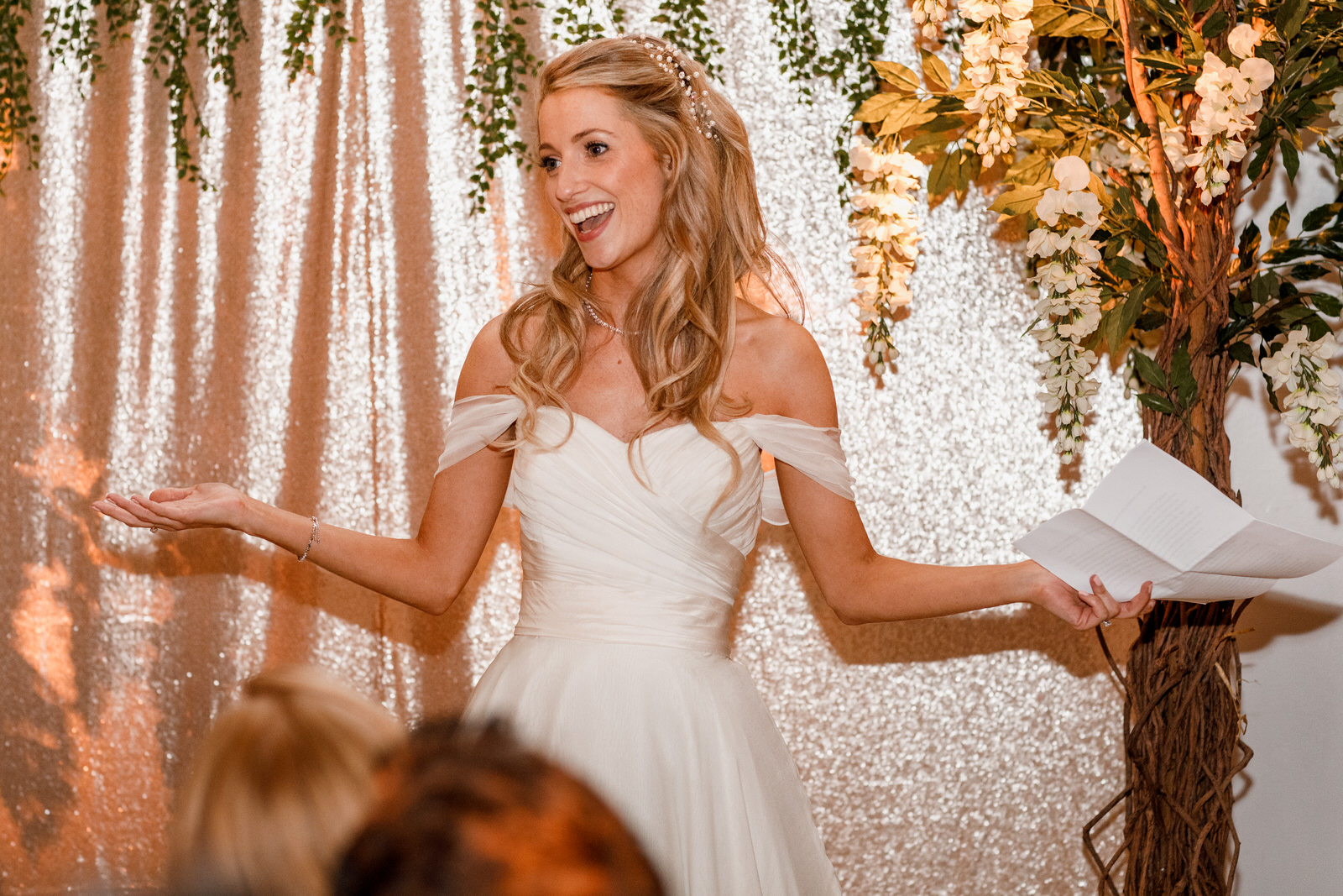 bride giving speech at her wedding