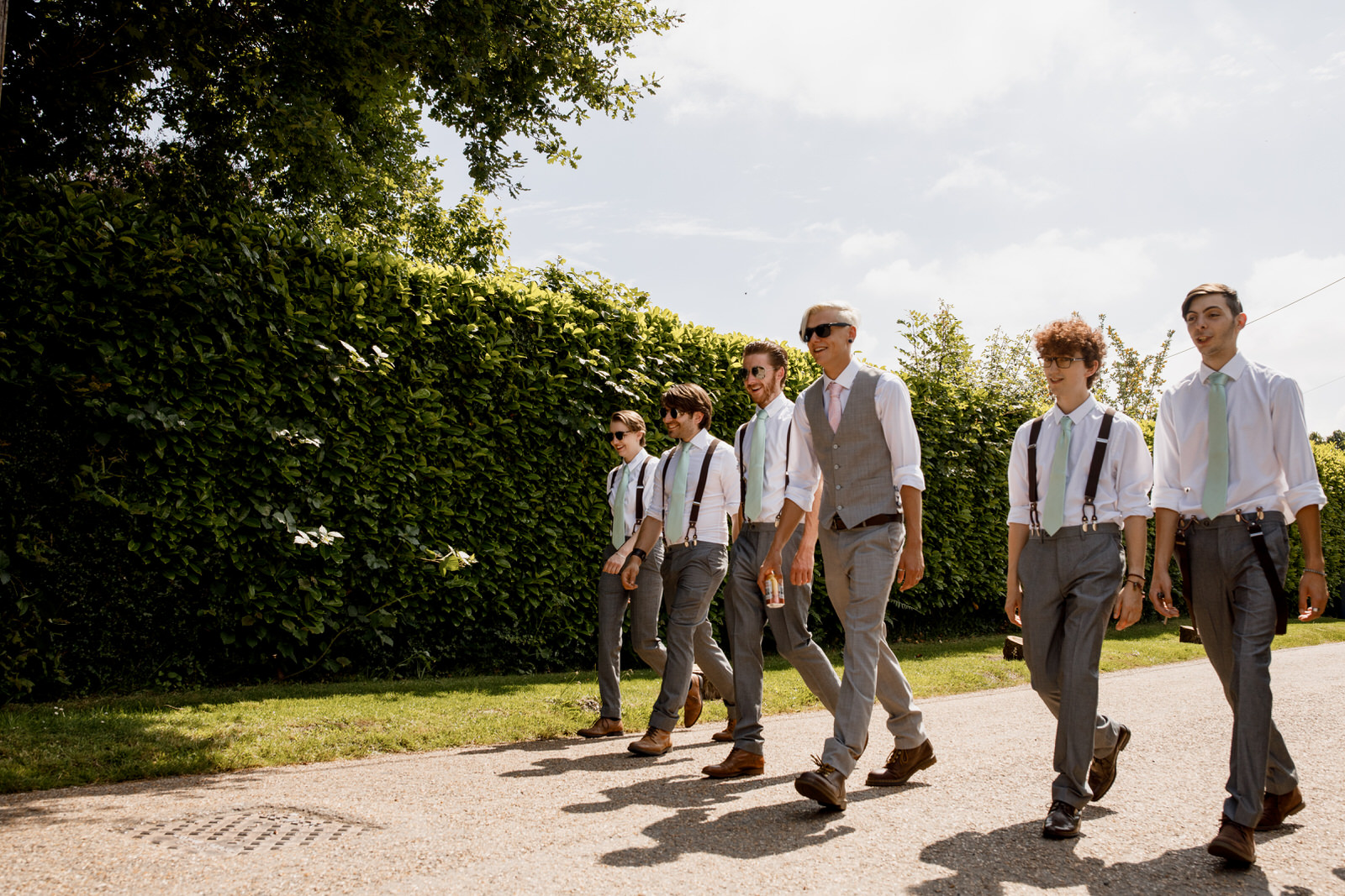 groom and ushers walking to ceremony