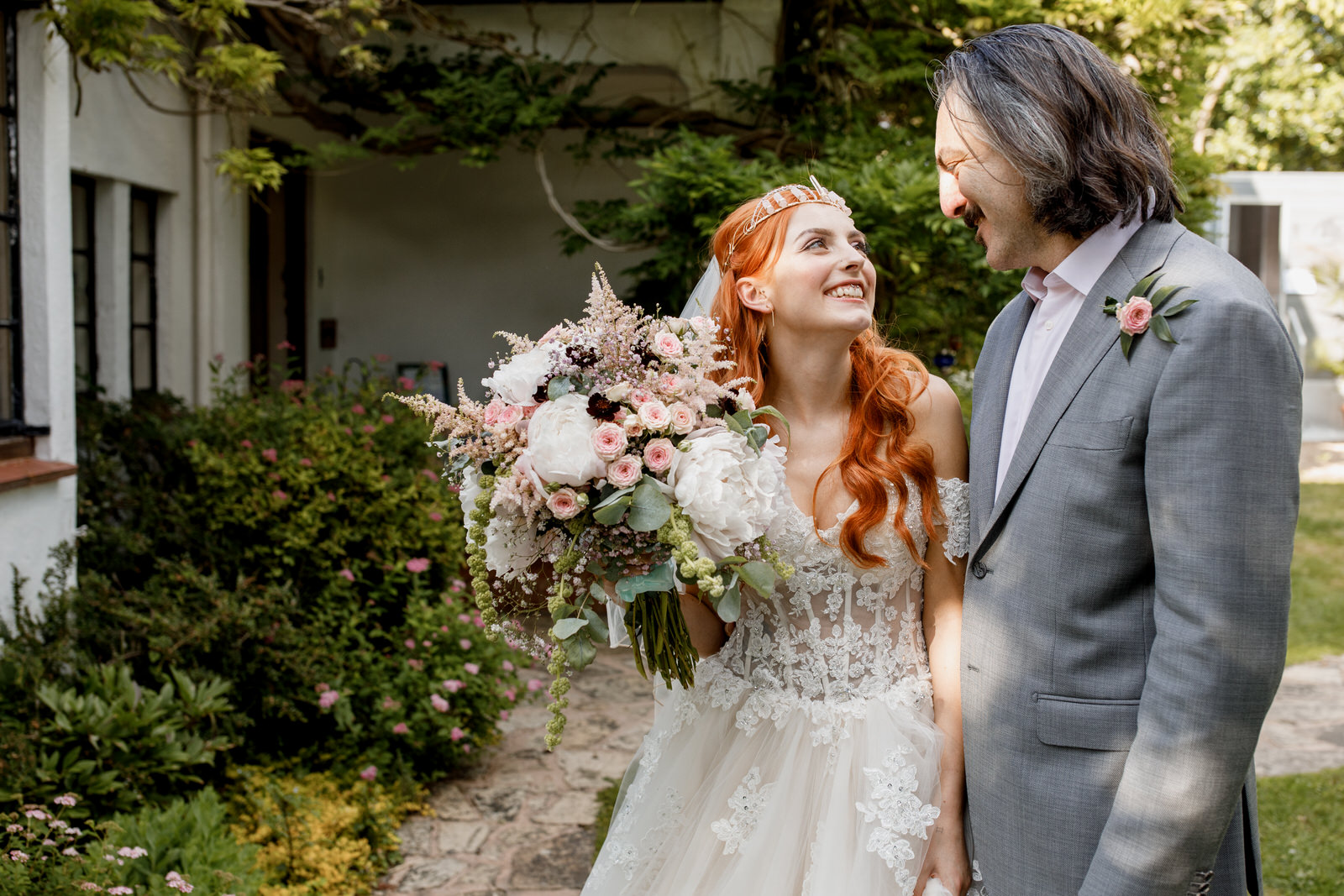 father giving bride away