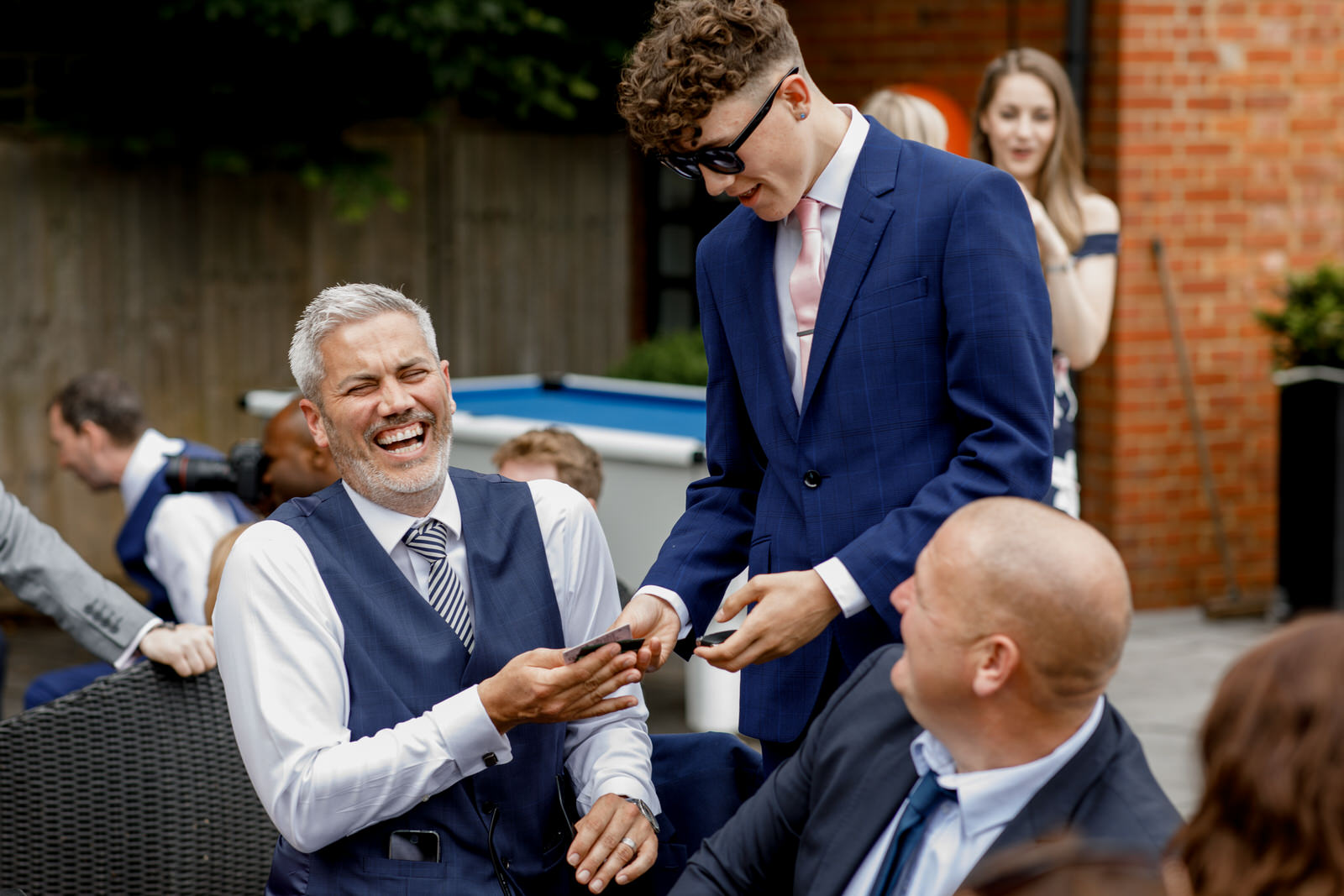 guests laughing at sanctum on the green wedding