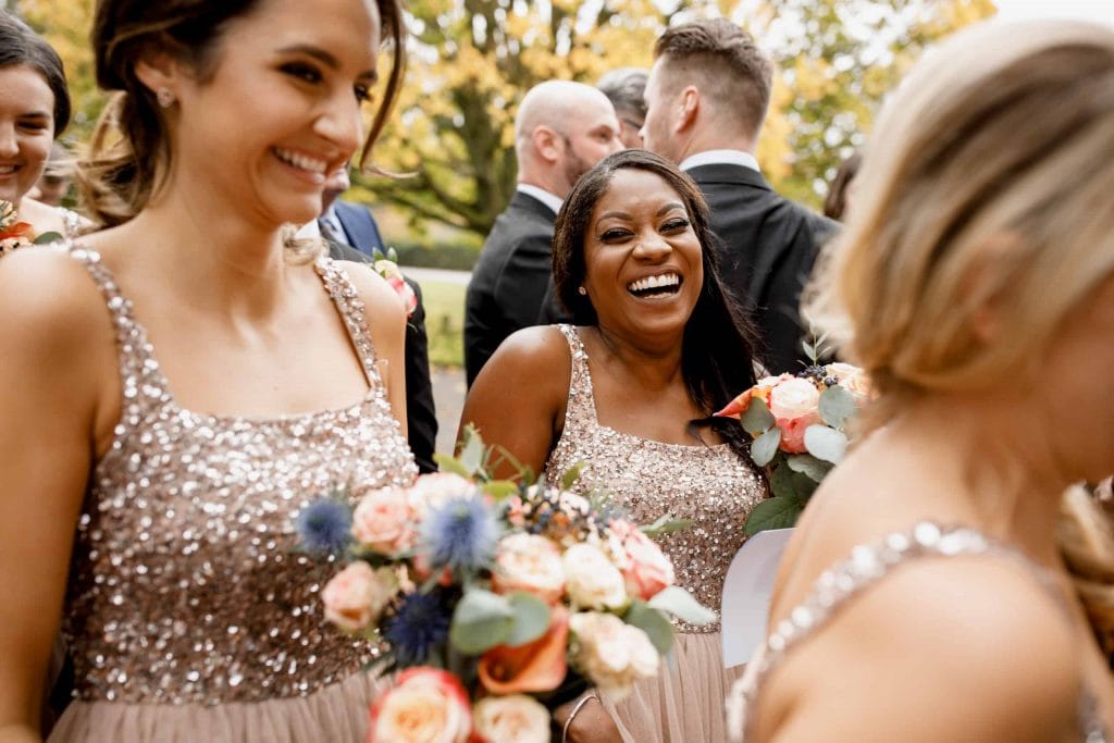 bridesmaids laughing at offley place wedding