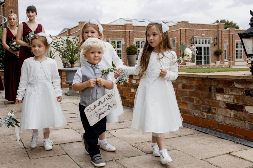 page boy with wedding sigj
