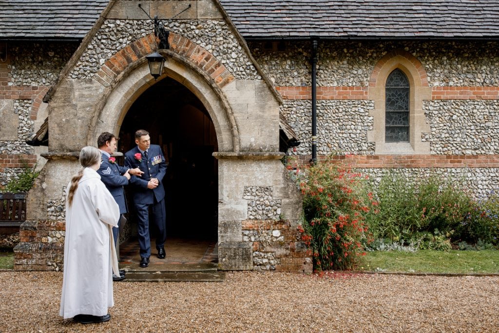groom and best man outside all saints church coleshill