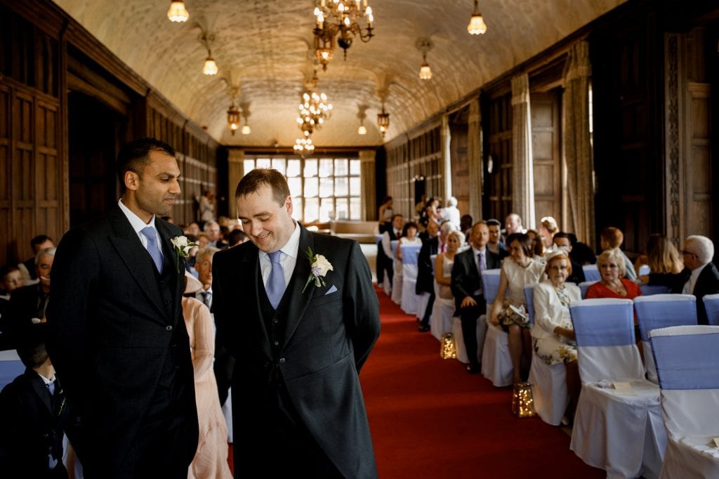 groom waiting for bride at front of ceremony