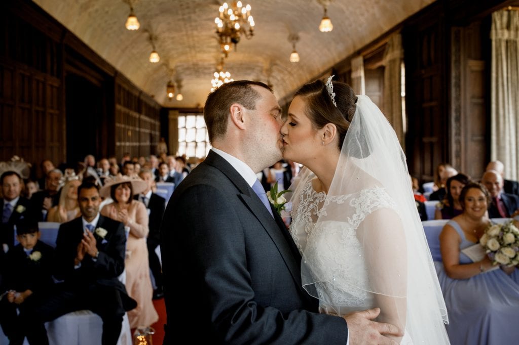 first kiss at fanhams hall wedding
