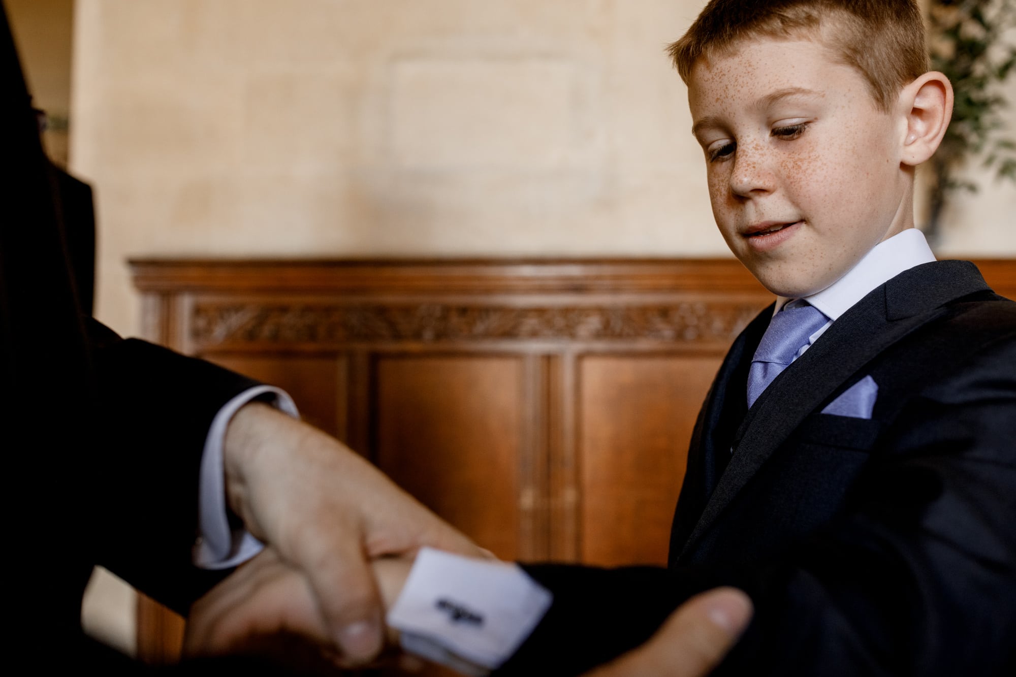 page boy doing cuffs up
