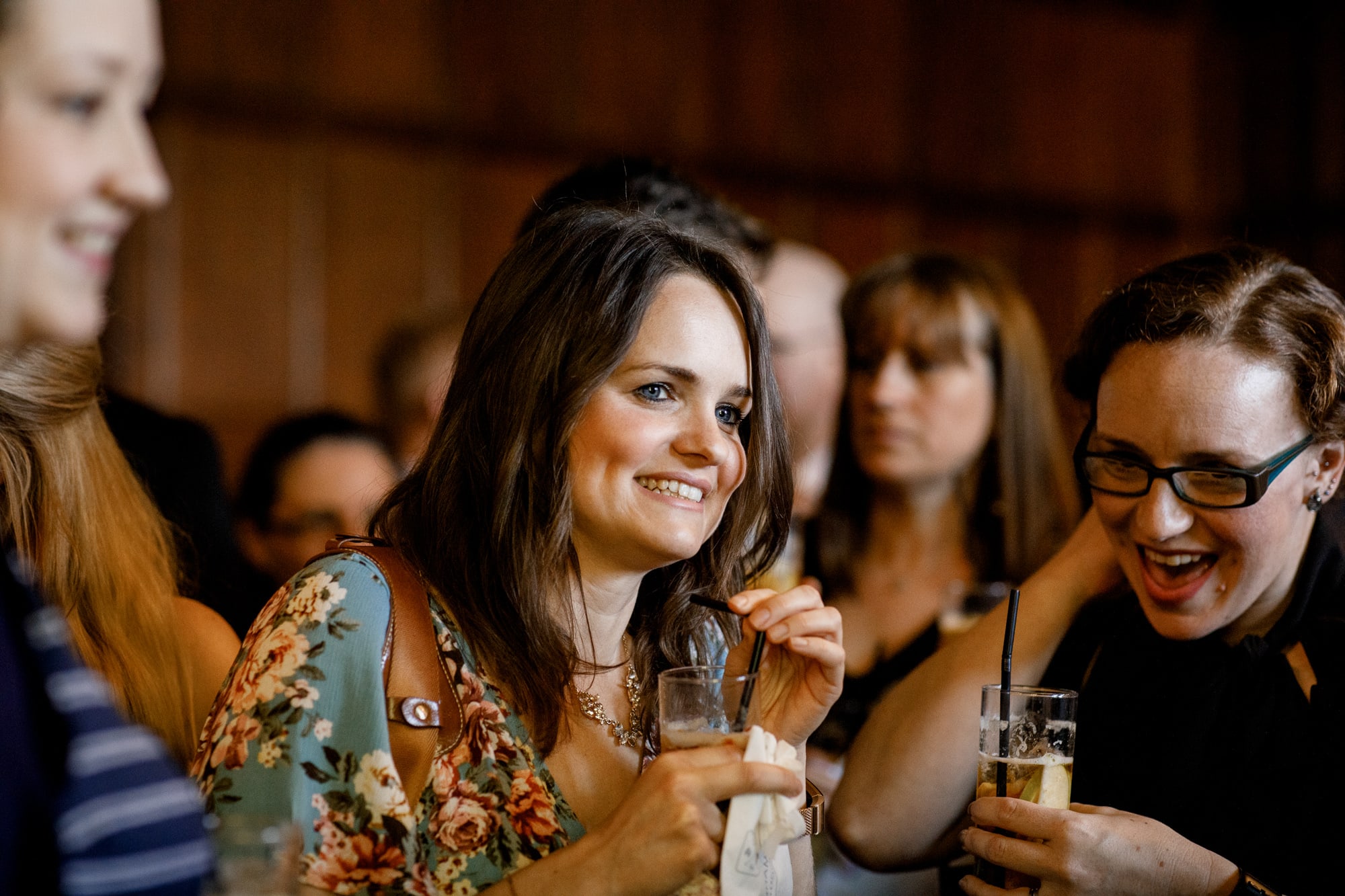 guests enjoying drink at wedding