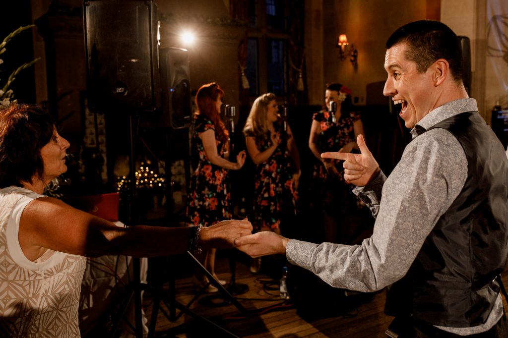 guests on dance floor at wedding