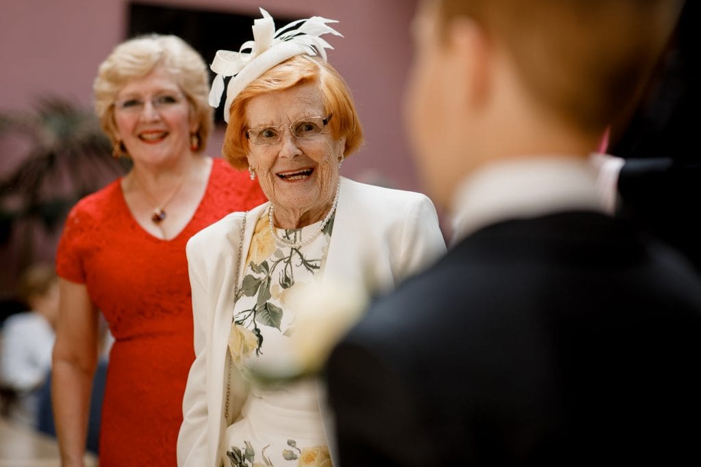 grandma smiling at page boy