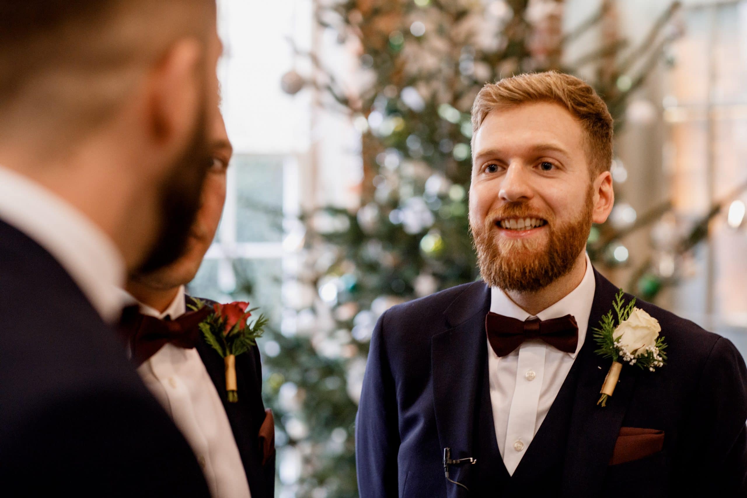 groom at winter wedding