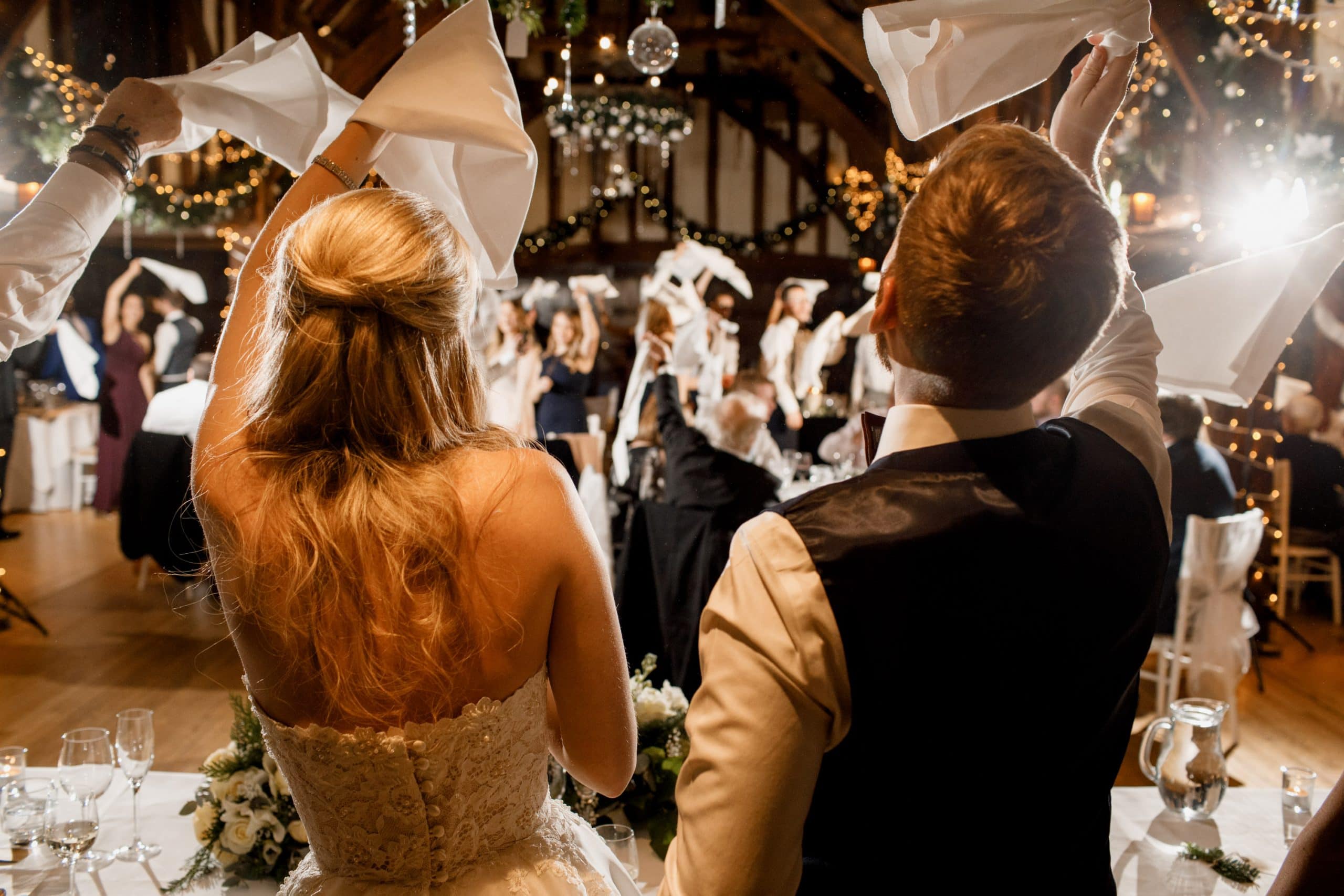 wedding guests singing at reception
