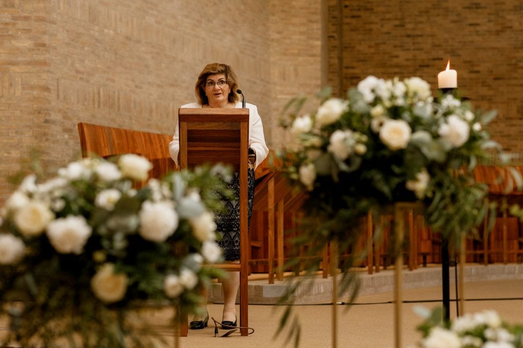 wedding speech behind flowers