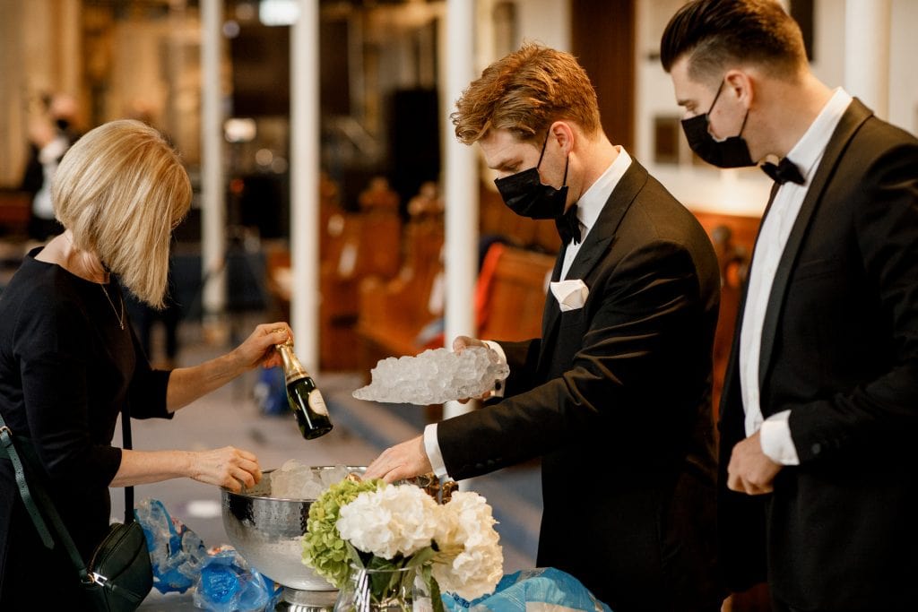 groom sorting final preparations before weddinng