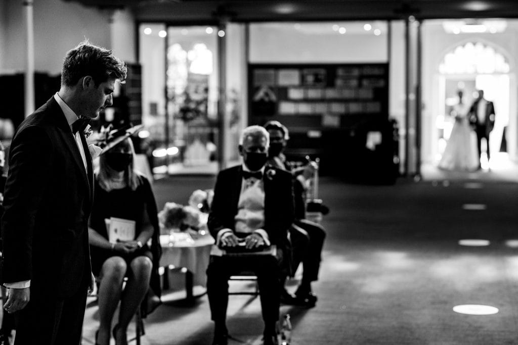 groom waiting for bride to arrive