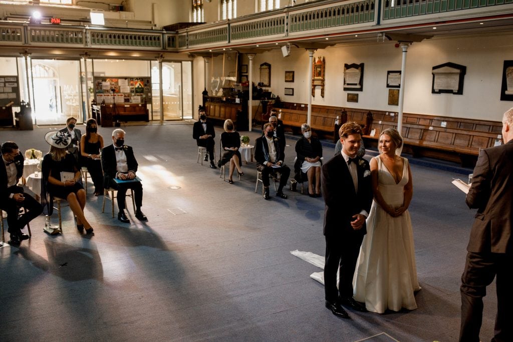 bride and groom at front of church